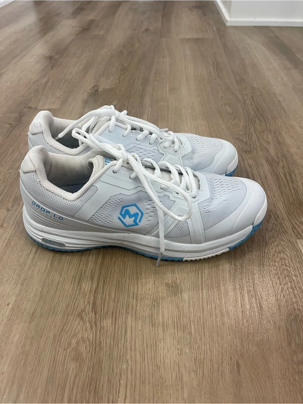 White Athletic Sneakers with Light Blue Accents